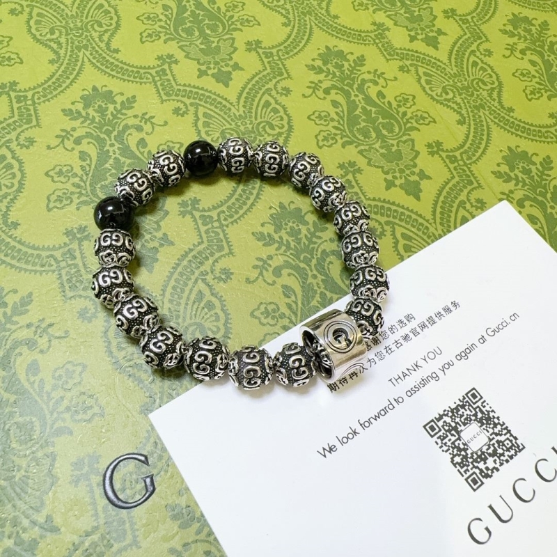 G*u*i bracelets